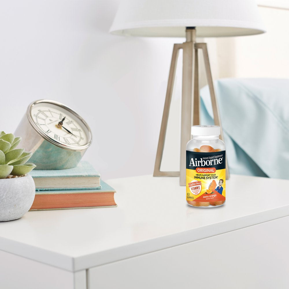 Airborne Zesty Orange Flavored Gummies, 63 Count - 750Mg of Vitamin C and Minerals & Herbs Immune Support (Packaging May Vary)