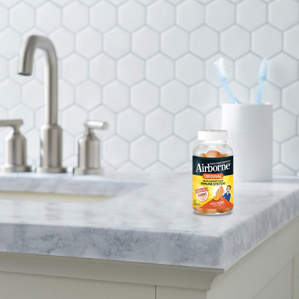 Airborne Zesty Orange Flavored Gummies, 63 Count - 750Mg of Vitamin C and Minerals & Herbs Immune Support (Packaging May Vary)