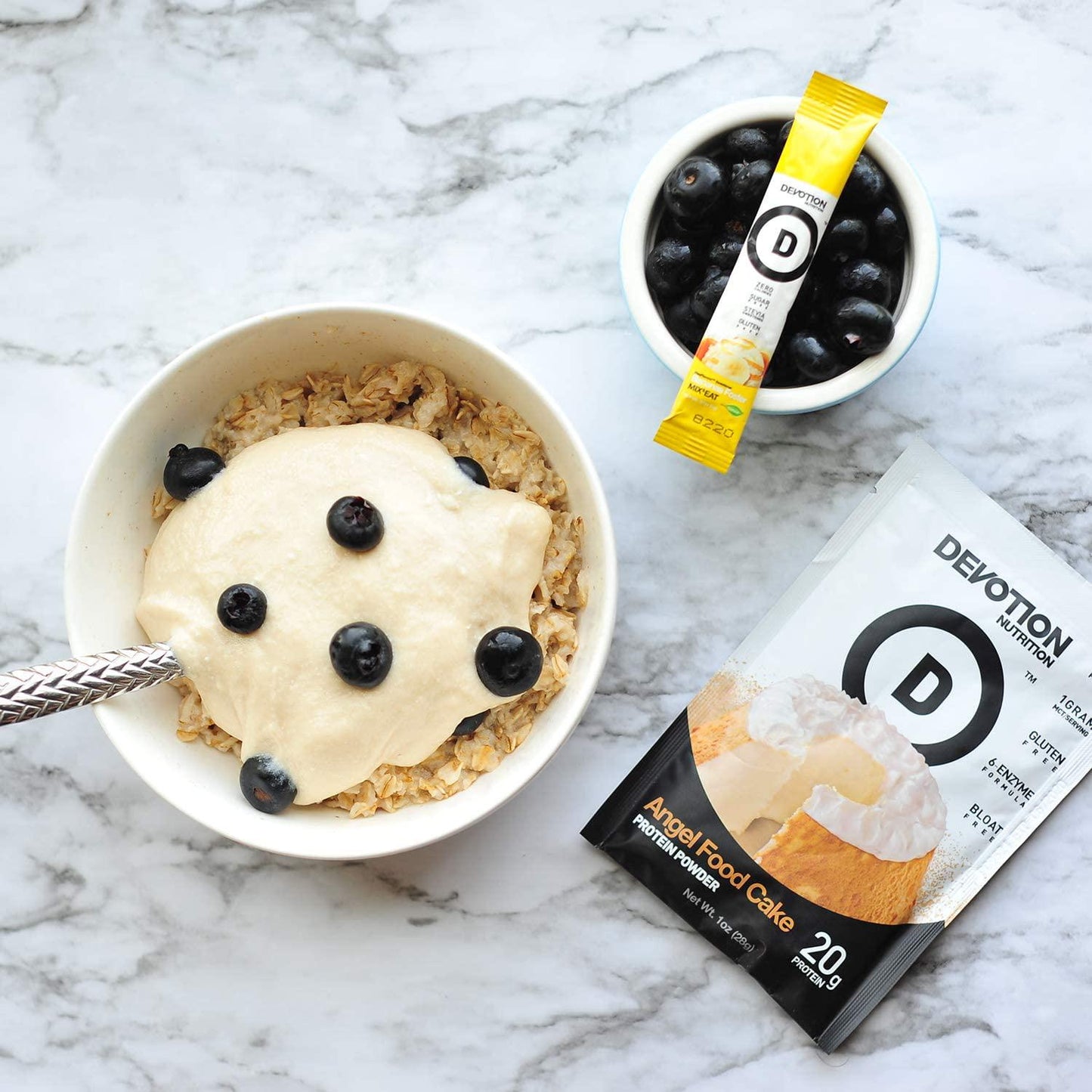 Devotion Nutrition Protein Powder Blend | Gluten Free, Keto Friendly, No Added Sugars | 2g MCTs | 20g Whey and Micellar Protein | 12 Single Serving Packets (Angel Food Cake) Packaging May Vary